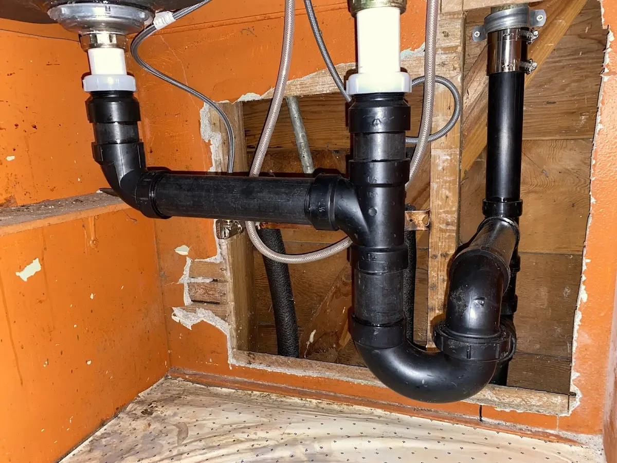 Professional Garbage Disposal Repair equipment and tools on the job in Ridgeway